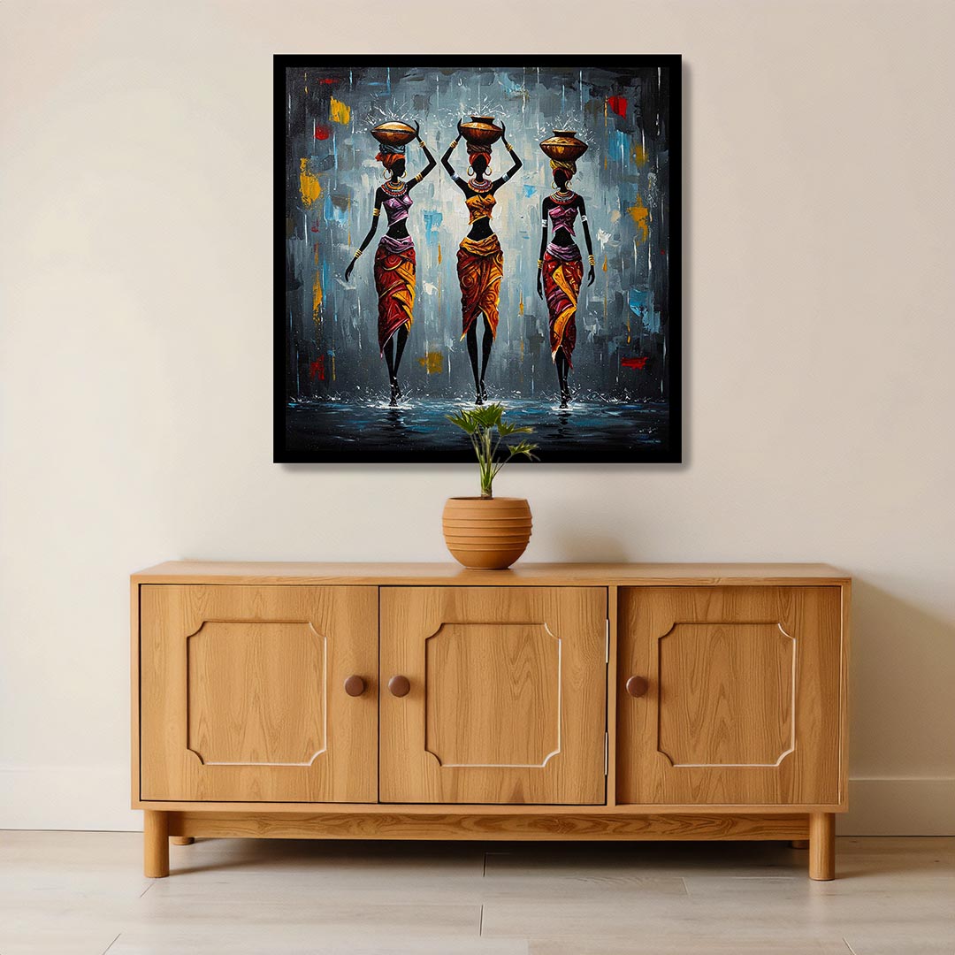 Wooden cabinet with a vase on top, featuring a colorful painting of three women on the wall above.