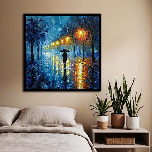 Framed painting of a rainy street scene above a bed with plants on a nightstand.